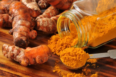 Turmeric root and powder used in herbal medicine to support vascular health and reduce inflammation